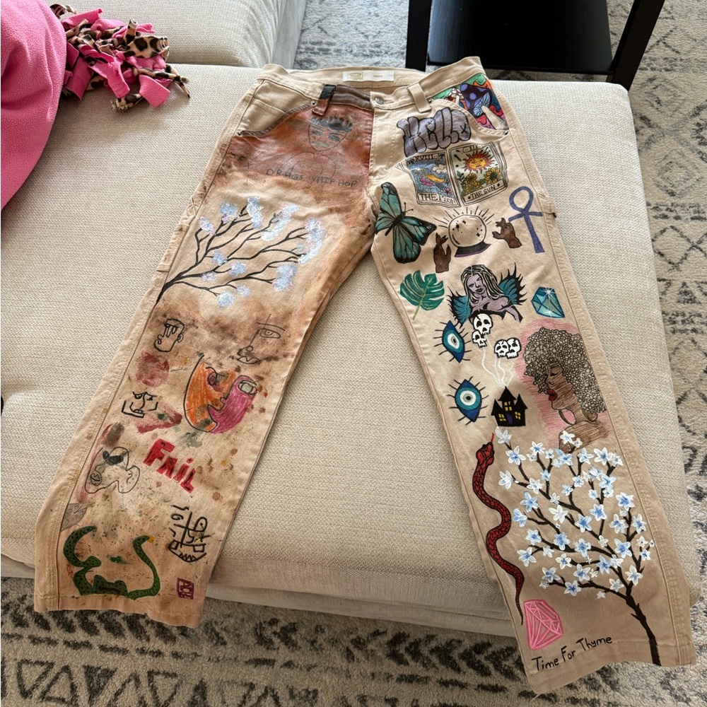 Tan Straight Leg Jeans with Artistic Embellishments